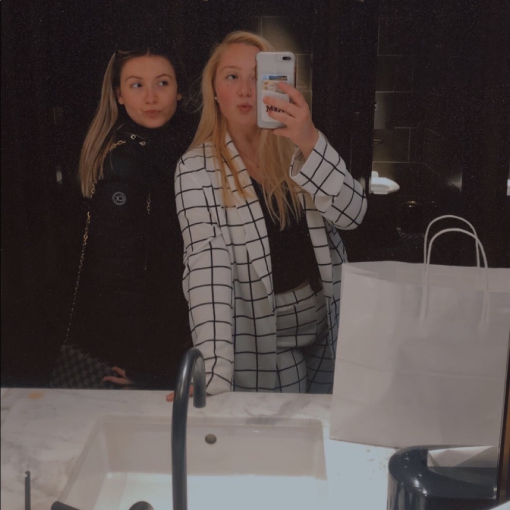 Black and white pant suit